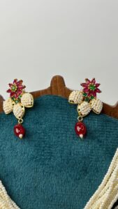 Earrings with floral embellishments.