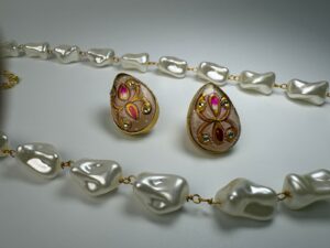 Elegant pearl necklace and earrings set.